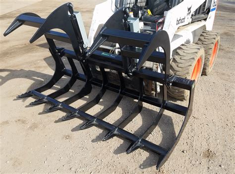 es skid steer attachments|express steel grapple.